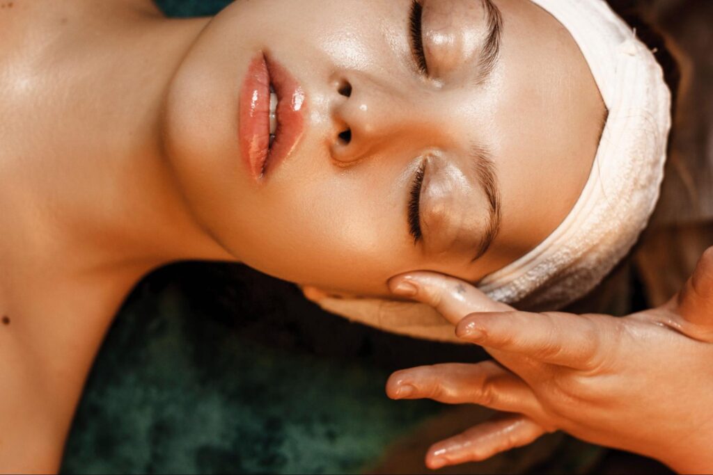 A client receiving a rejuvenating medspa facial treatment at Sandia Skin + Face.