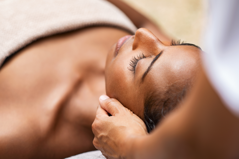 Woman receiving DiamondGlow Facial at a medspa.