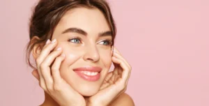 Smiling woman with glowing skin after DiamondGlow Facial.